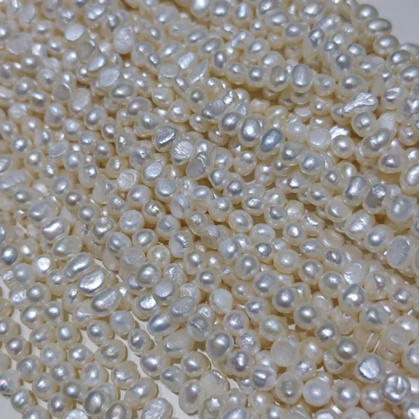 6-7mm White Baroque Freshwater Pearl Strands, AAA Grade