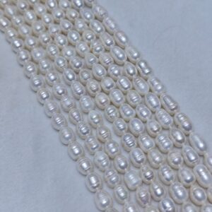 Fil de perles d'eau douce orange de 6-7 mm | Fabricant de perles de France - Fabricant de perles de France